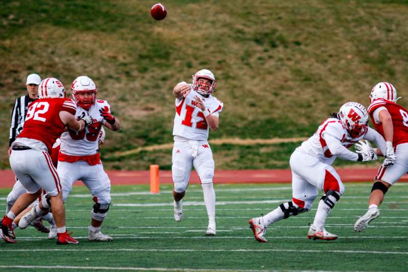 a group of people playing football