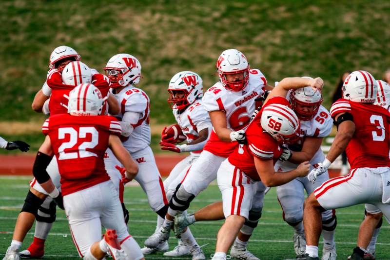 a group of football players on a field