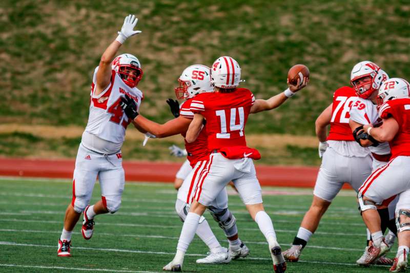 a group of football players on a field