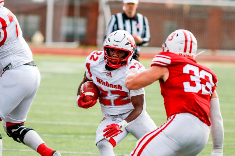 a football player running with the ball