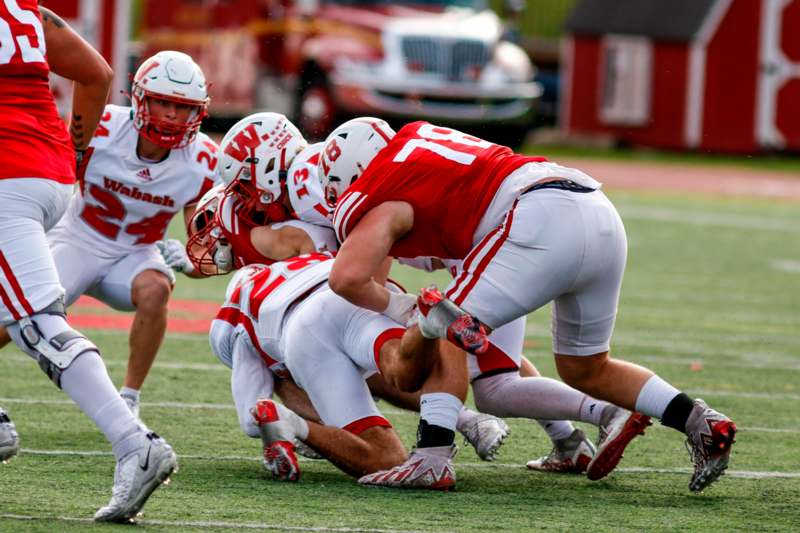 a group of football players on a field