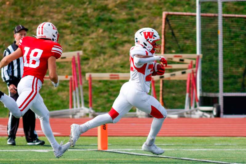 a football players running on a field