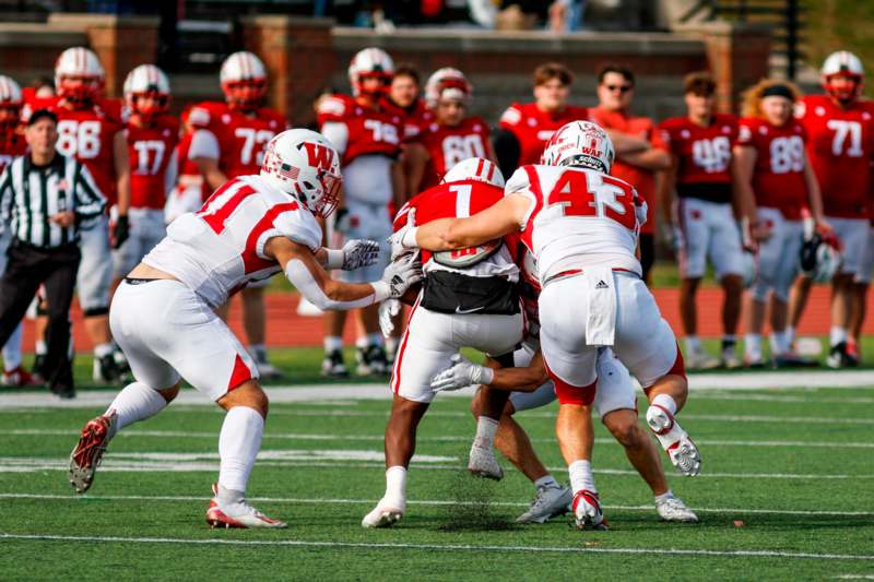 a group of football players on a field