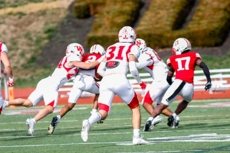 a group of football players on a field