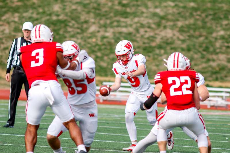 a group of football players on a field