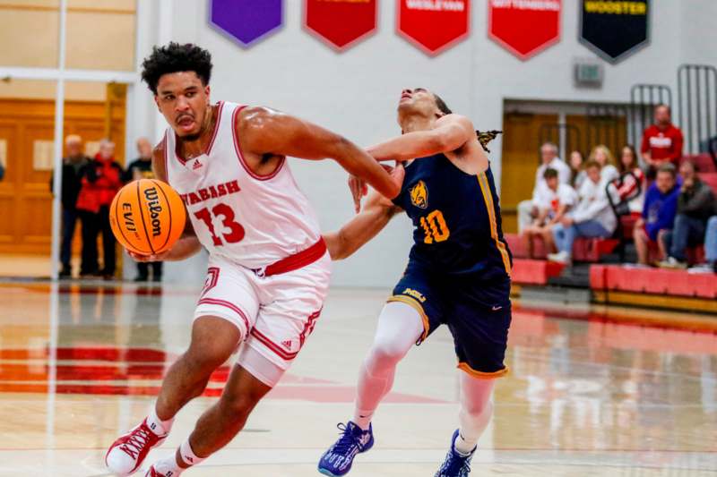 a basketball player chasing a basketball