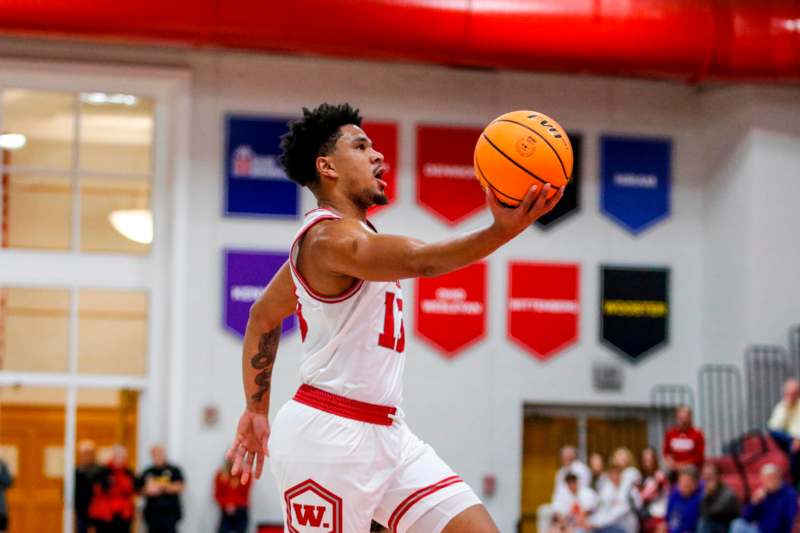 a man in a basketball uniform