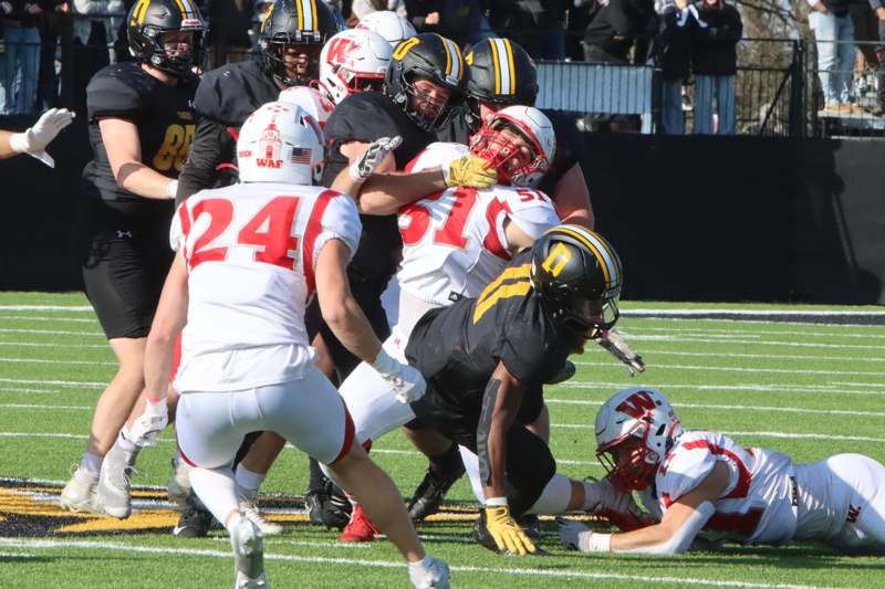 a group of football players on a field