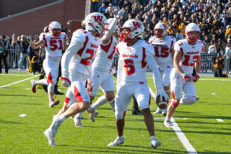 a group of football players on a field