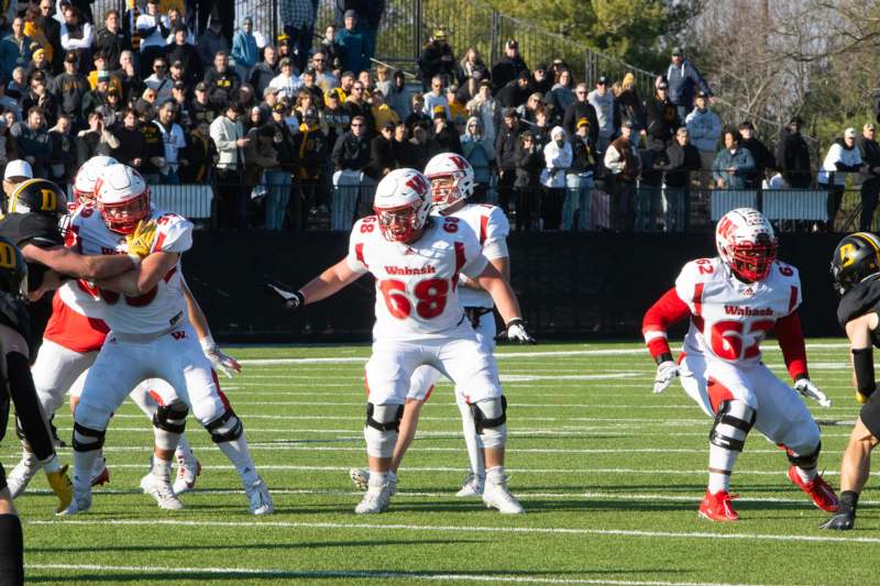 a group of football players on a field