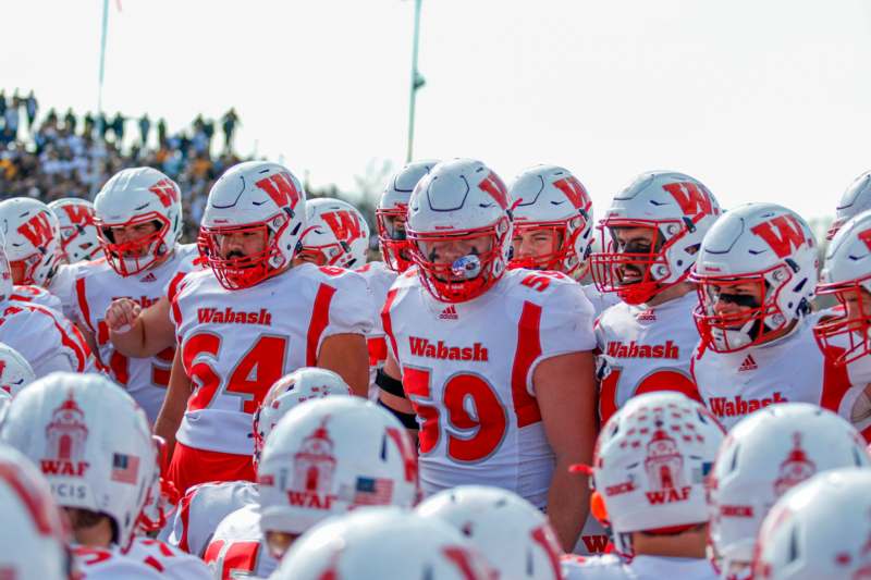 a group of football players in a crowd