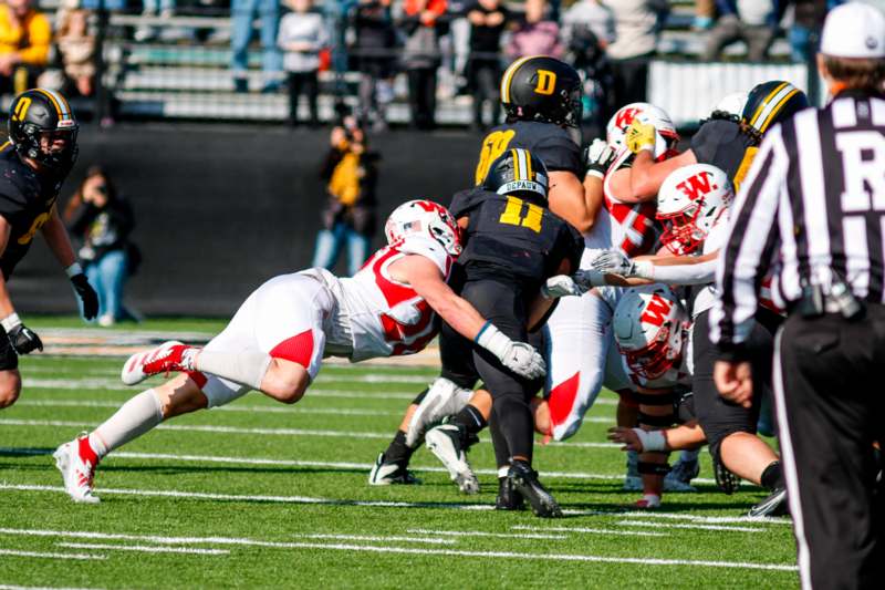 a group of football players on a field