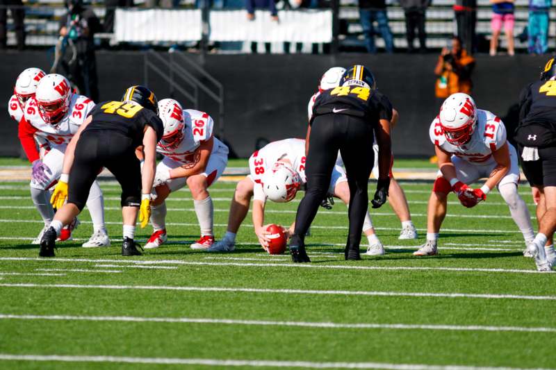 a group of football players on a field