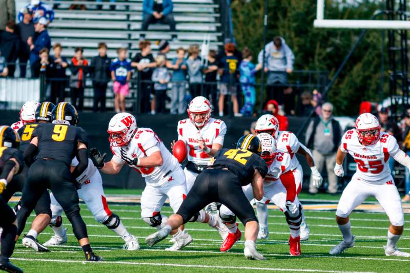 a group of people playing football