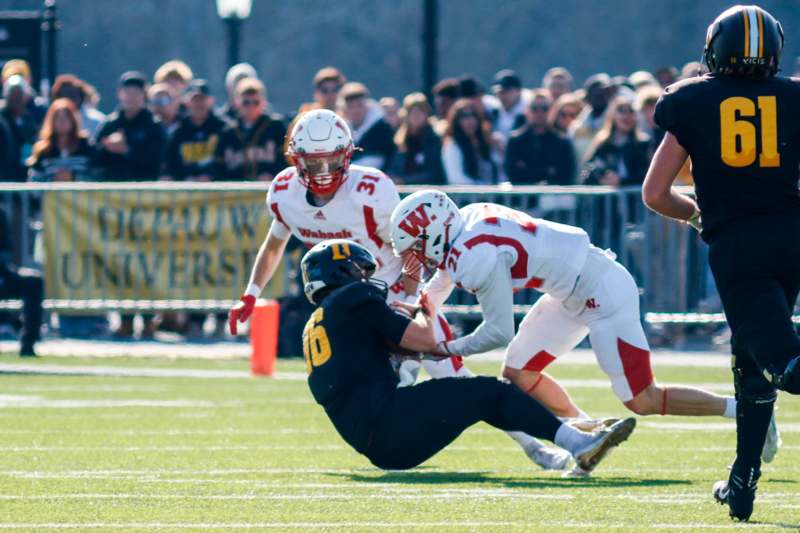 a group of people playing football