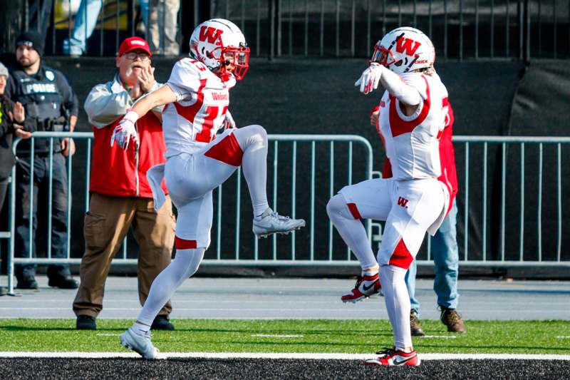 a group of football players on a field