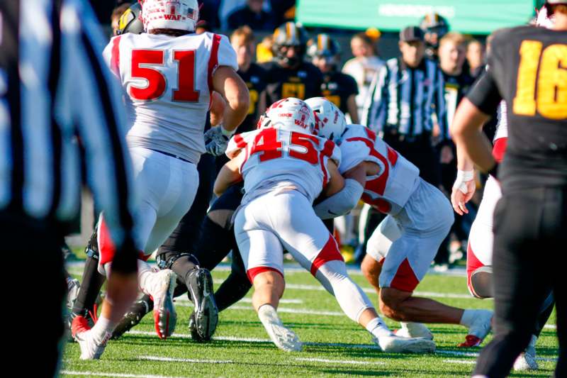 a group of football players on a field