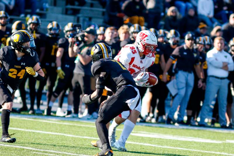 a football player running with a ball