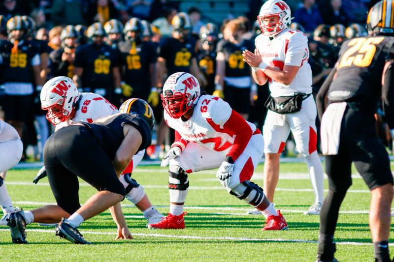 a group of football players on a field