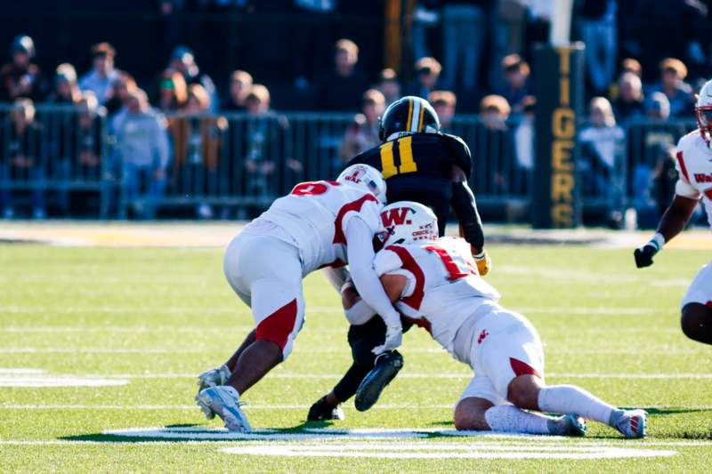 a group of football players on a field