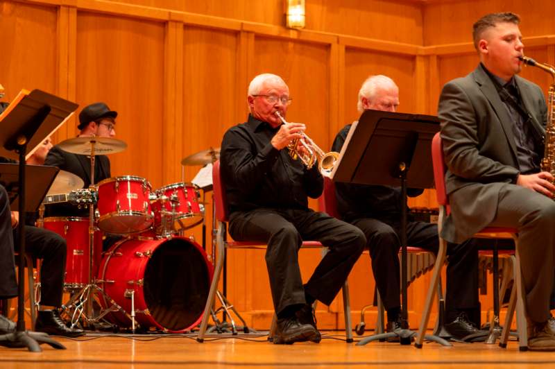 a group of people playing instruments