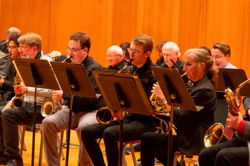 a group of people playing instruments