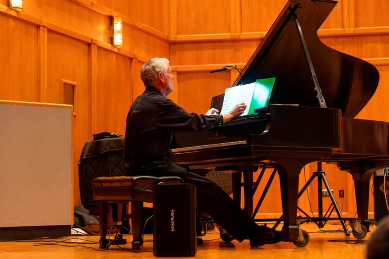 a man playing a piano