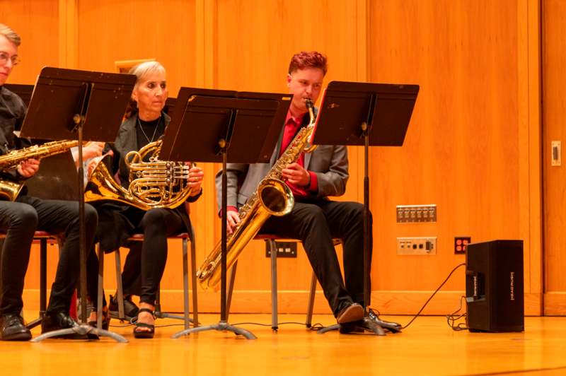 a group of people playing instruments