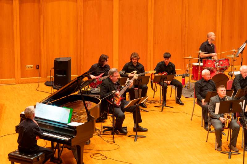 a group of people playing instruments