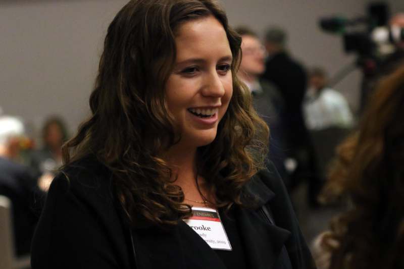 a woman smiling at camera