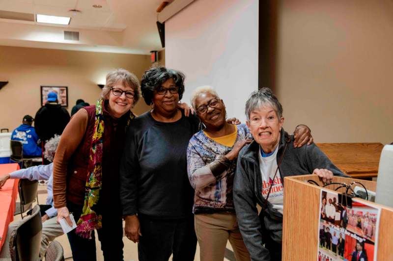 a group of women standing together