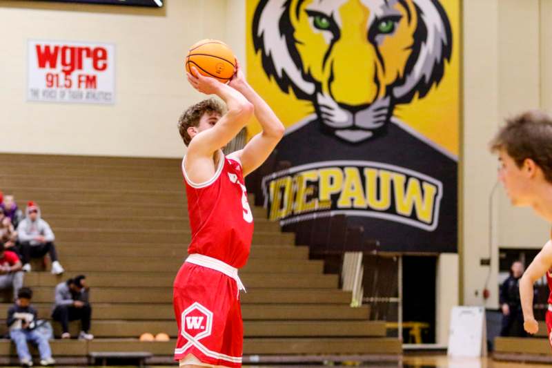 a man in a basketball uniform