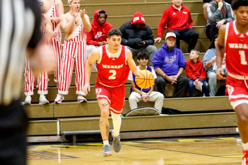 a basketball player running with a ball