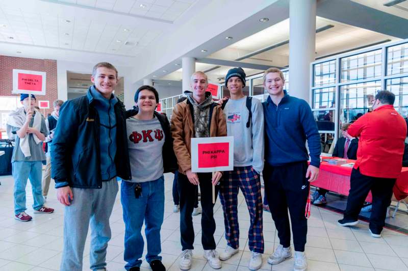 a group of people posing for a photo