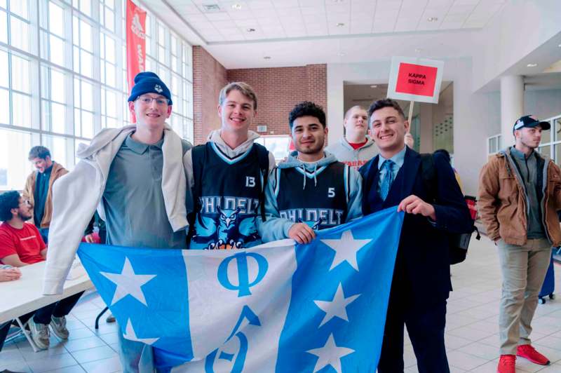 a group of men holding a flag