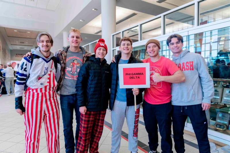 a group of people posing for a photo