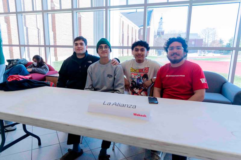 a group of people sitting at a table