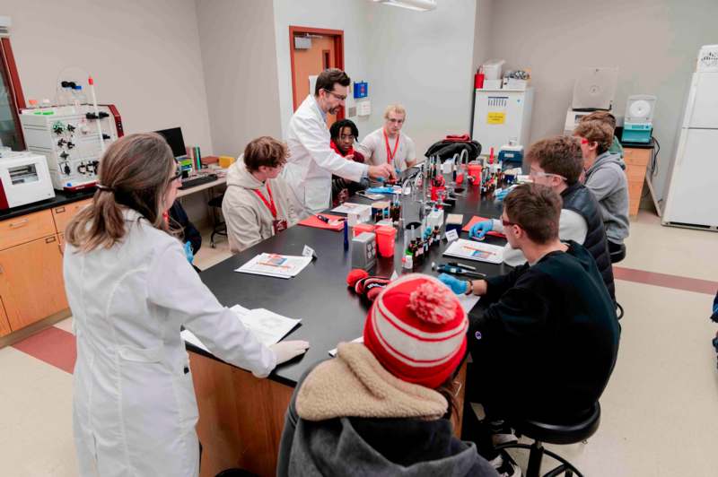 a group of people in a lab