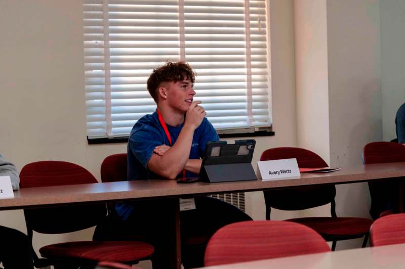 a man sitting at a table