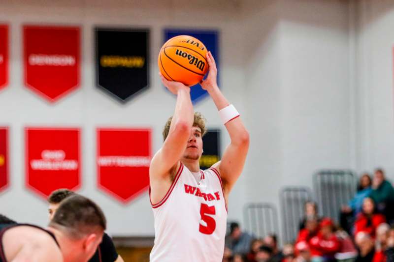 a man in a basketball uniform