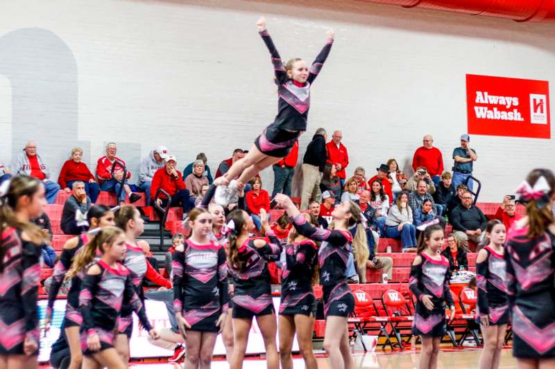 a cheerleaders in the air