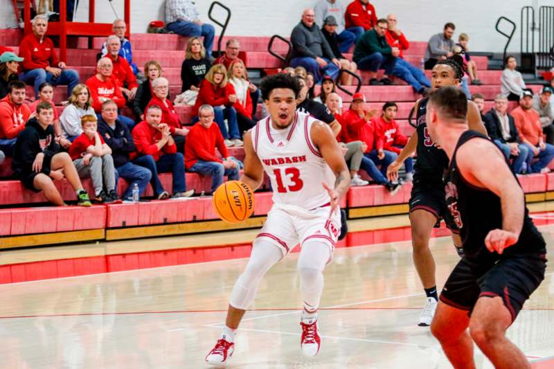 a basketball player dribbling a ball