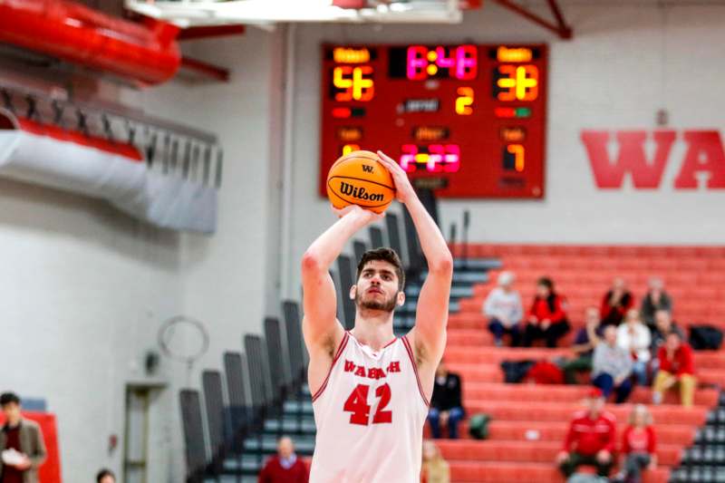 a man in a basketball uniform