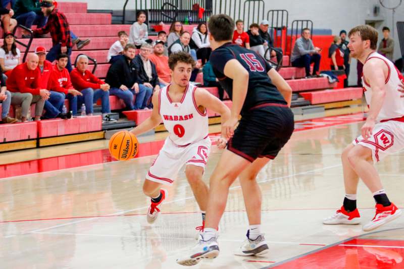 a basketball player dribbling a basketball