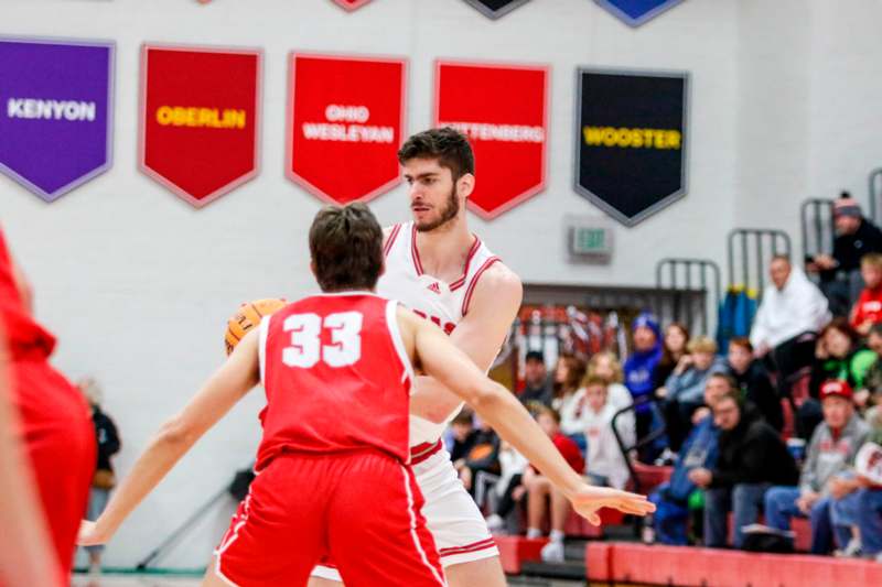 a basketball player in a red uniform