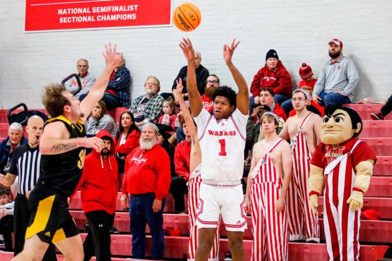 a group of people in a basketball game