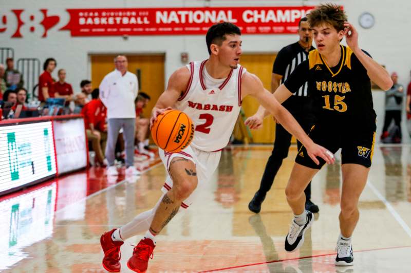 a basketball player dribbling a basketball