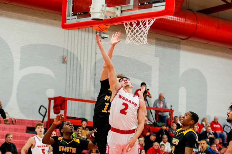 a basketball player dunking a basketball