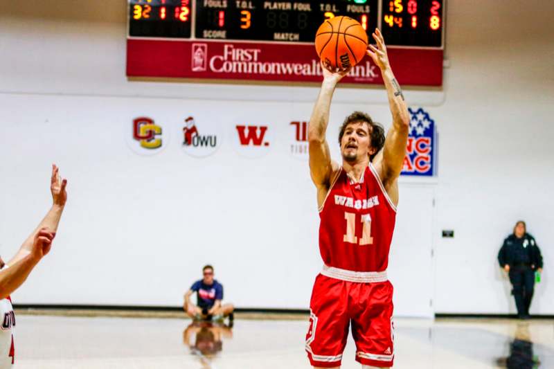 a man in a basketball uniform