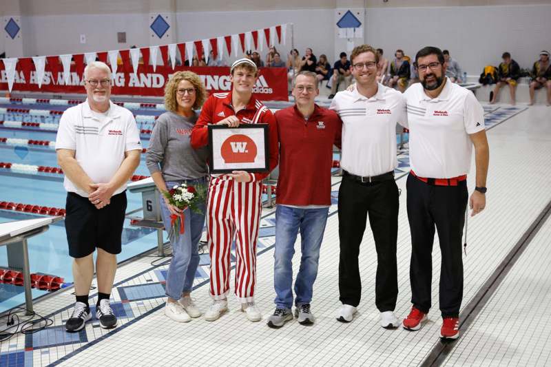 a group of people posing for a photo